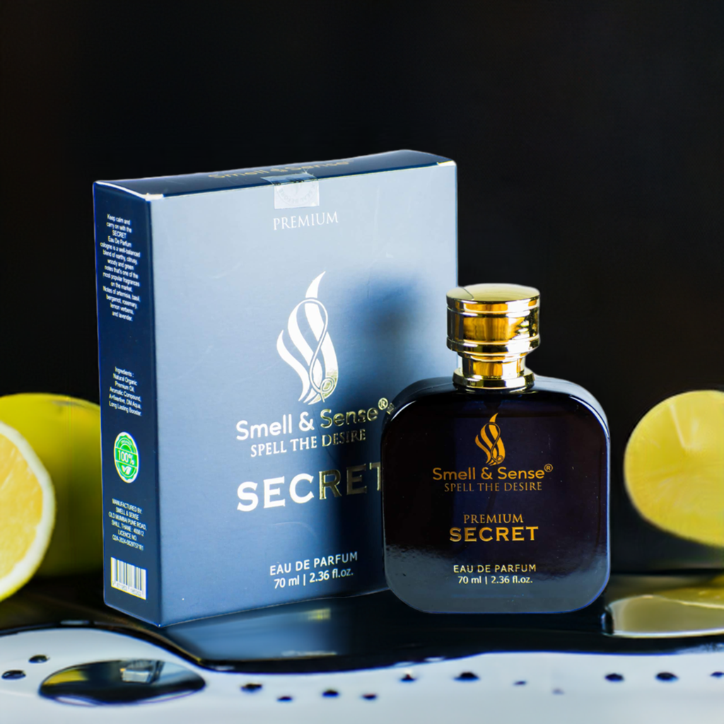 Bold Secret perfume bottle by Smell & Sense surrounded by fresh citrus fruits, showcasing its invigorating scent.