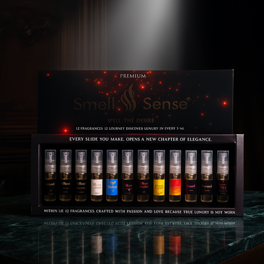 Smell & Sense Red Velvet 12×5ml perfume gift set featuring 12 luxurious fragrances in a bold black and red box, placed on a glossy marble surface under golden spotlight, symbolizing romance, passion, and premium craftsmanship