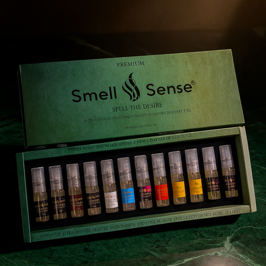 Smell & Sense Royal Essence 12×5ml luxury perfume gift set featuring 12 handcrafted unisex fragrances in an elegant green box, displayed on a royal marble surface with soft light reflecting timeless sophistication.
